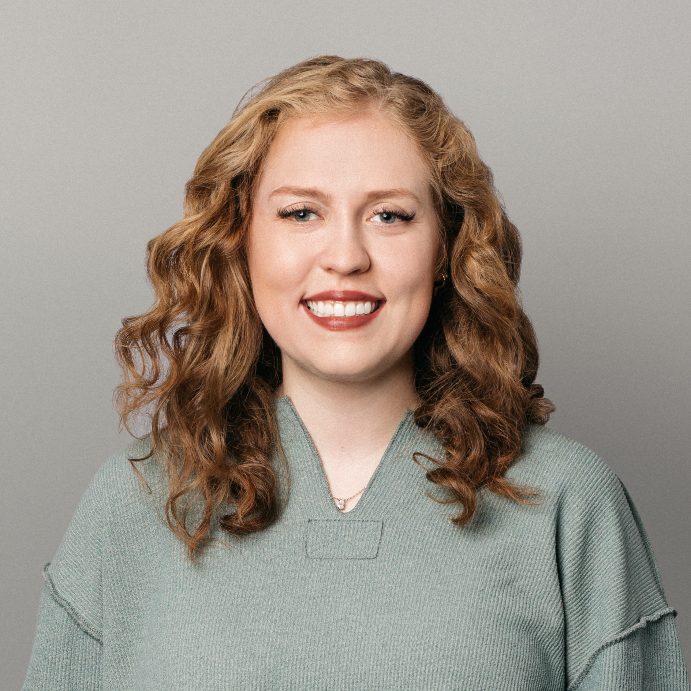 Headshot of Greta Chase, Associate Language Strategist at maslansky + partners